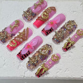 Glamorous Handmade Pink Nail Art with Zebra Print, Gemstone & Gold Embellishments D052