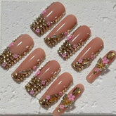 Glamorous Handmade Nude Pink Nail Art with Crystal and Floral Embellishments D060