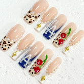Stylish Handmade Nail Art: Nude - Inspired Designs with Leopard Print, Cherry and Pearl Embellishments D072