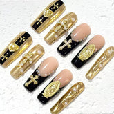 Luxurious Handmade Nail Art: Gold, Black and Nude Fusion with Religious Embellishments D059