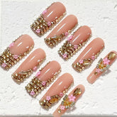 Glamorous Handmade Nude Pink Nail Art with Crystal and Floral Embellishments D060