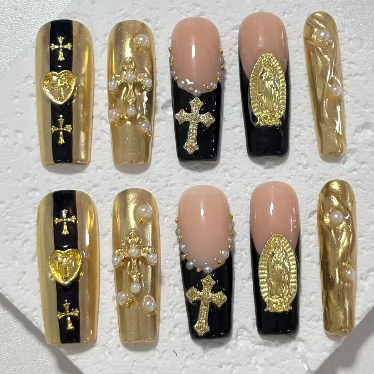 Luxurious Handmade Nail Art: Gold, Black and Nude Fusion with Religious Embellishments D059