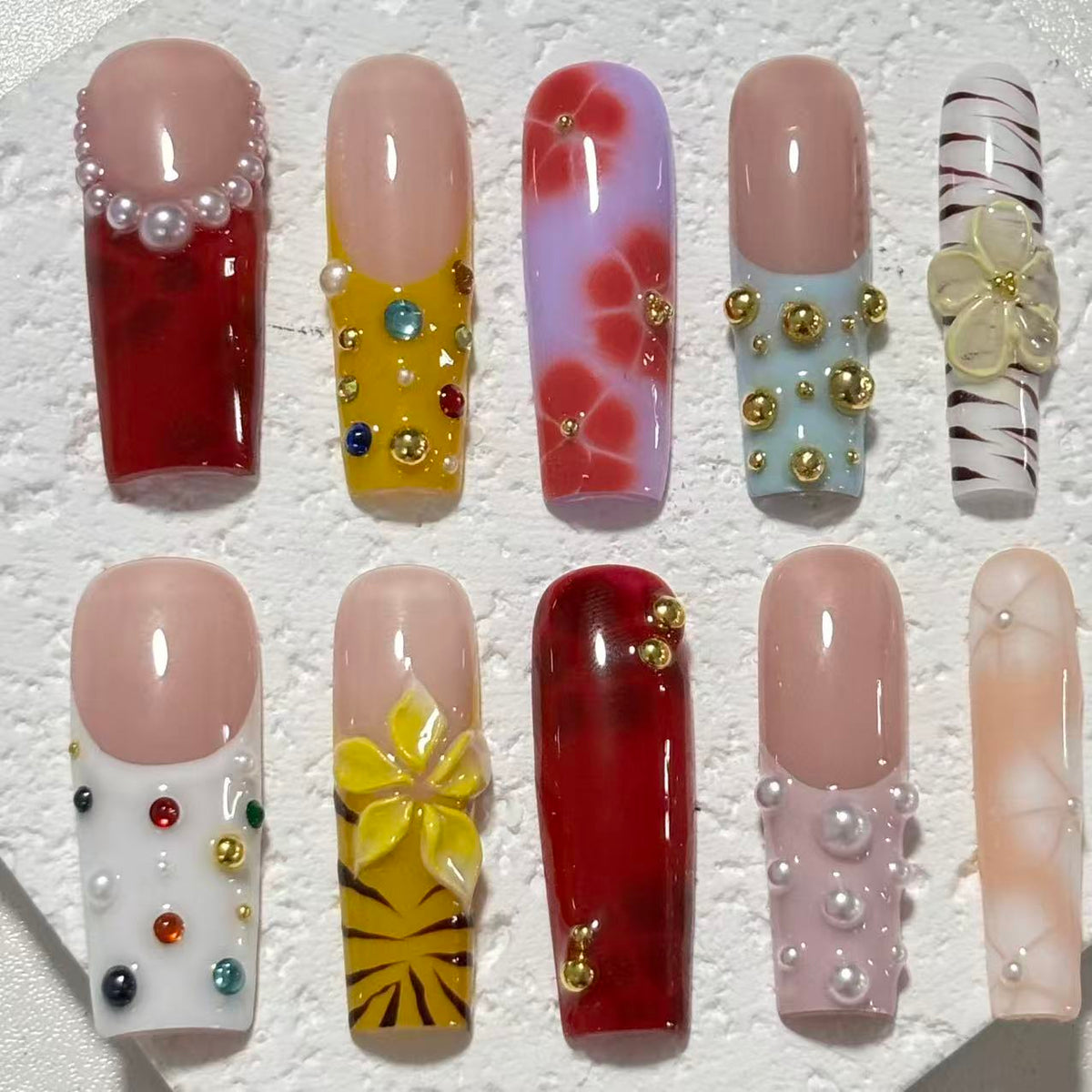 Vibrant Handmade Nail Art: Diverse Patterns and Embellishments Collection D064