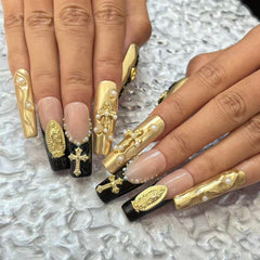 Luxurious Handmade Nail Art: Gold, Black and Nude Fusion with Religious Embellishments D059