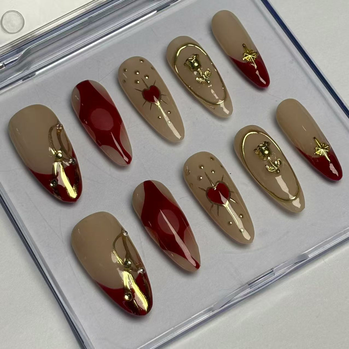 Elegant Ruby & Gold Almond - shape Nails D030