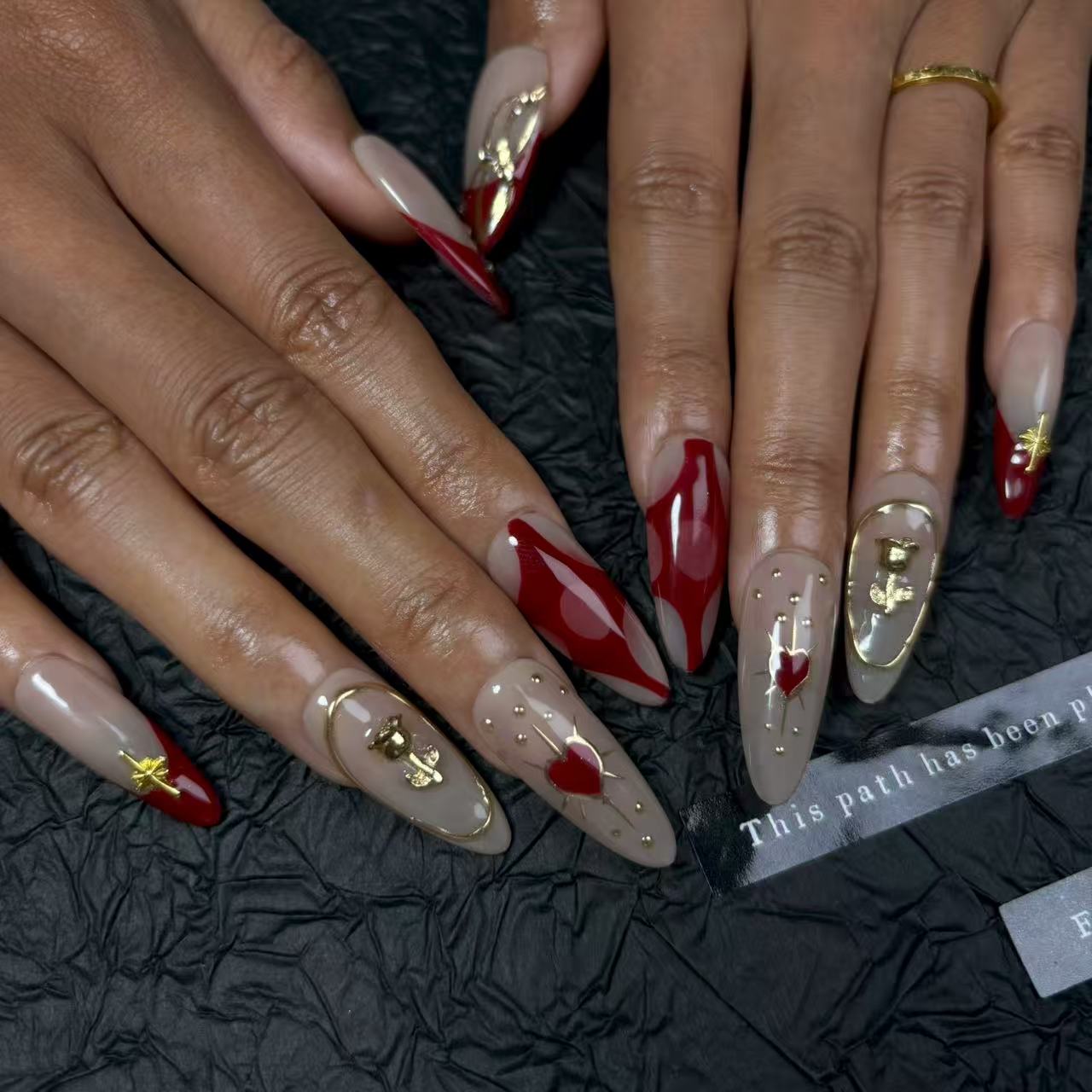 Elegant Ruby & Gold Almond - shape Nails D030